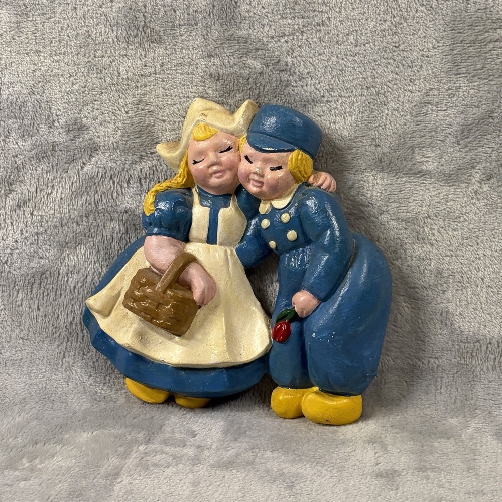 vintage hand-painted chalkware  featuring a Dutch boy‎ and girl